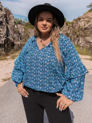 Chic plus size ruffled tie blouse